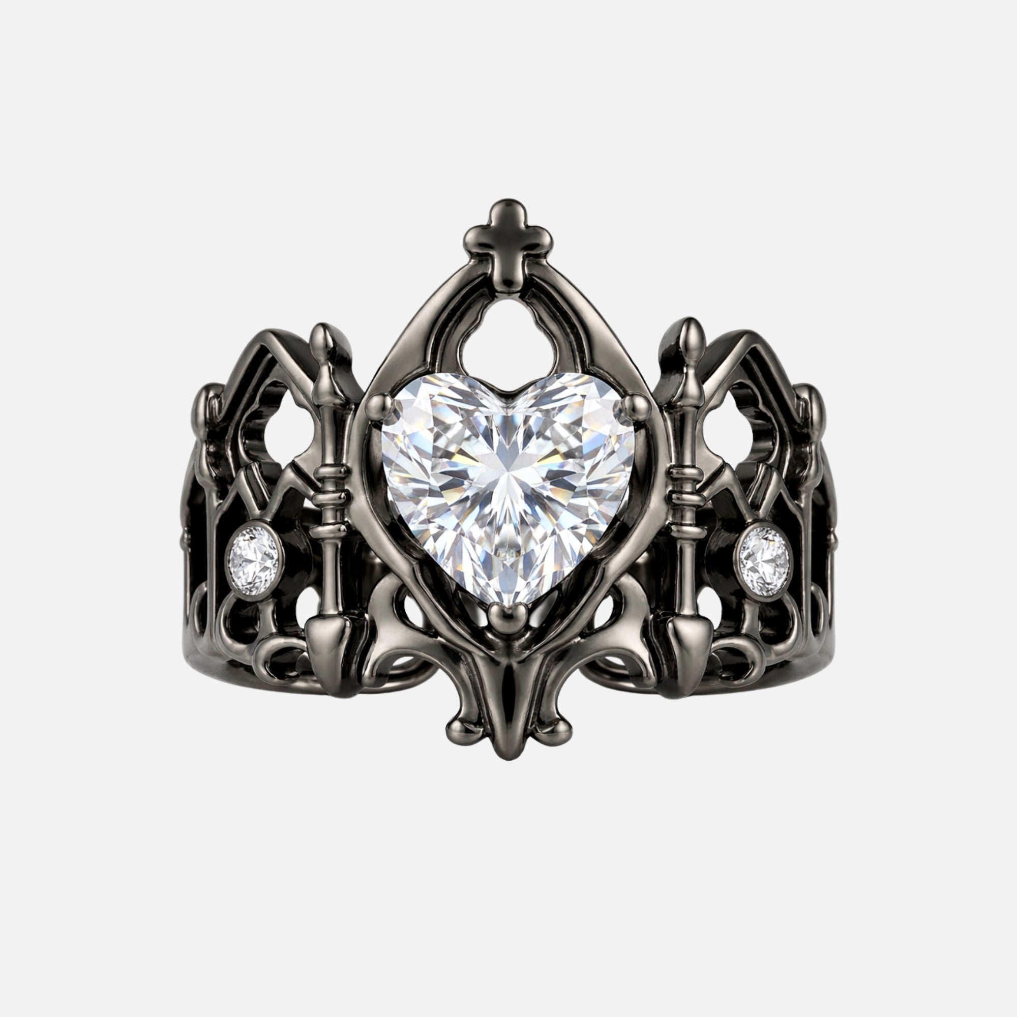 Devotion gothic cathedral heart ring in black metal with clear zirconia heart stone, cross crown detail, and openwork arch band